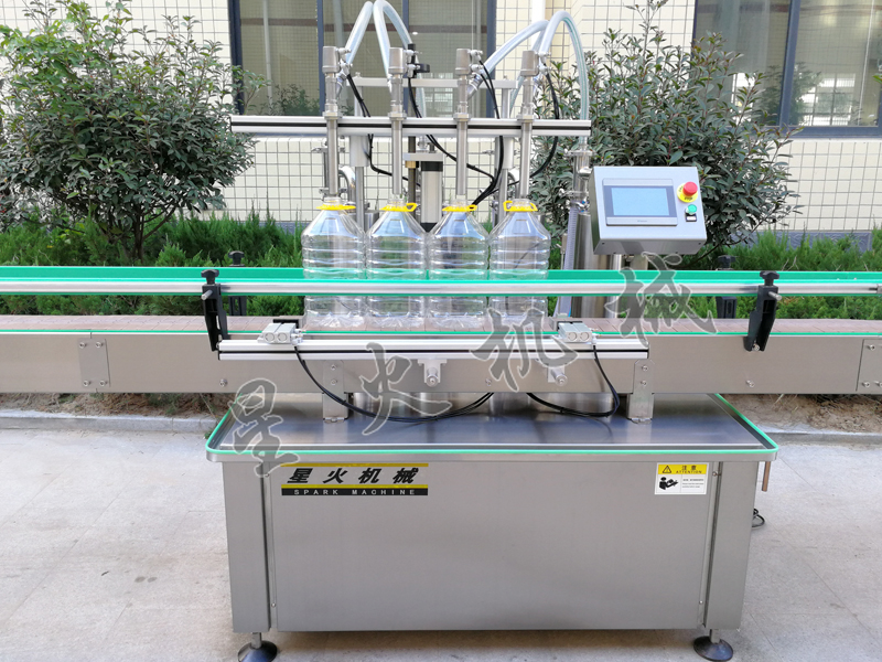 新型四头食用油自动称重灌装旋盖机-2.jpg